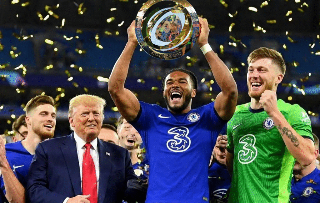 Chelsea captain Reece James holding the Club World Cup 2025 trophy with teammates celebrating around him; Donald Trump standing nearby on the presentation podium.