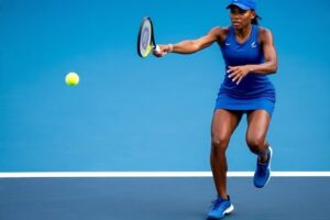Victoria Mboko pumps her fist after defeating Elena Rybakina in the Montreal semifinals to reach her first WTA final.