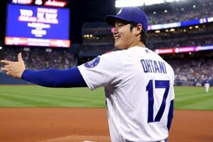 Shohei Ohtani hitting a home run to mark his 1,000th career MLB hit for the Los Angeles Dodgers.